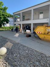 Arbeiten an den Hochwasserschäden in Untereschbach